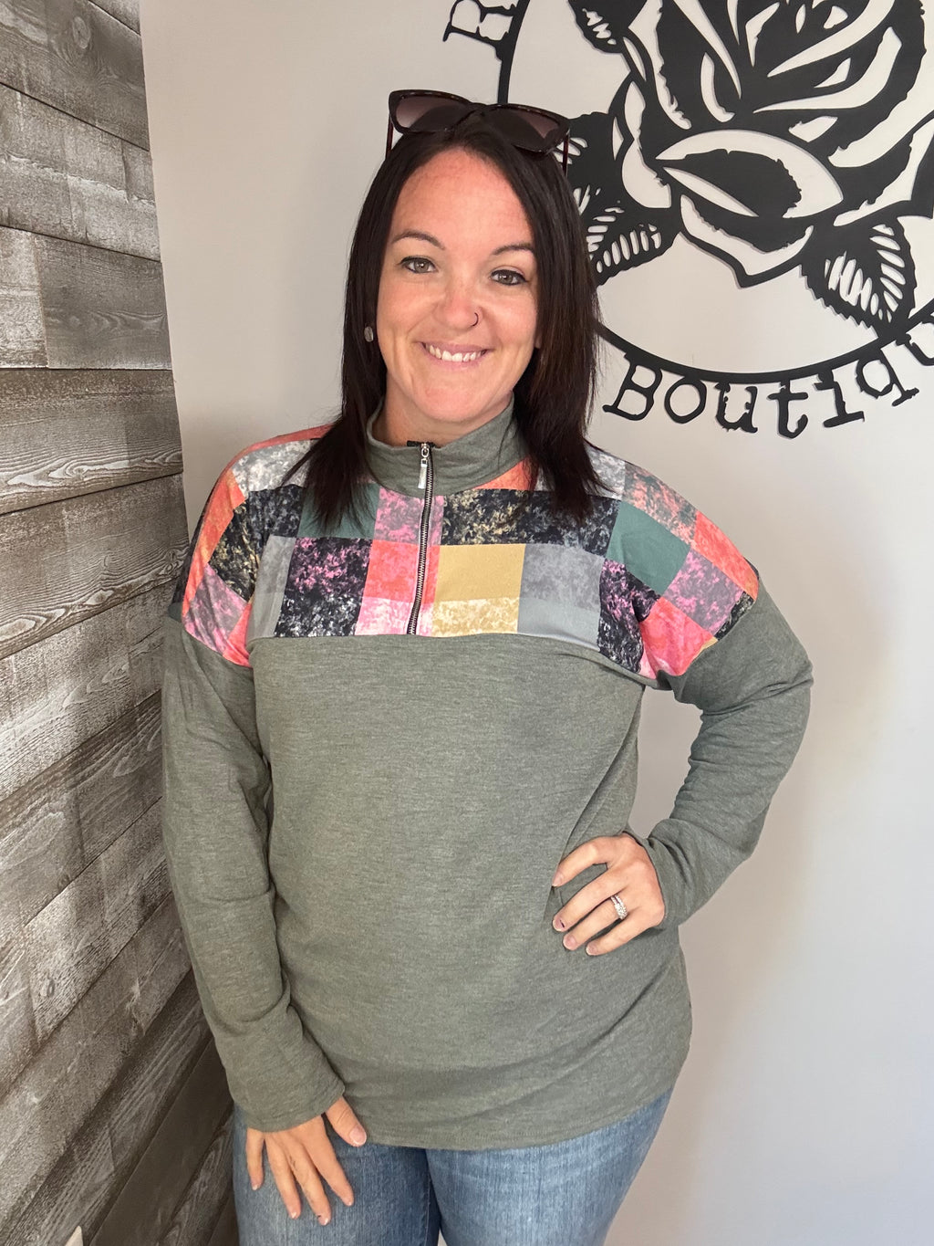 Olive and pink patchwork half zip top. 1x