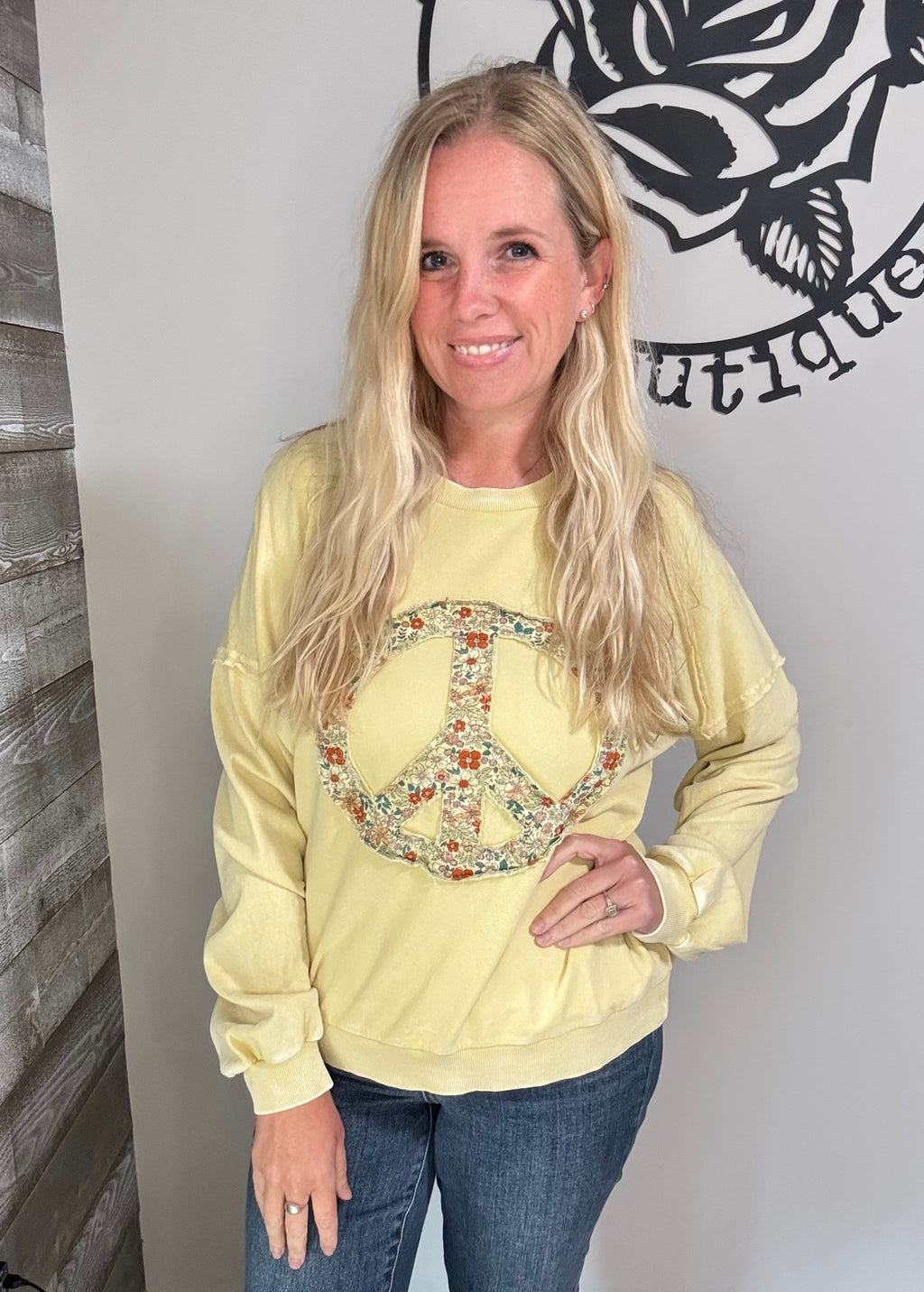 Creamy corn peace sign washed terry pullover. S