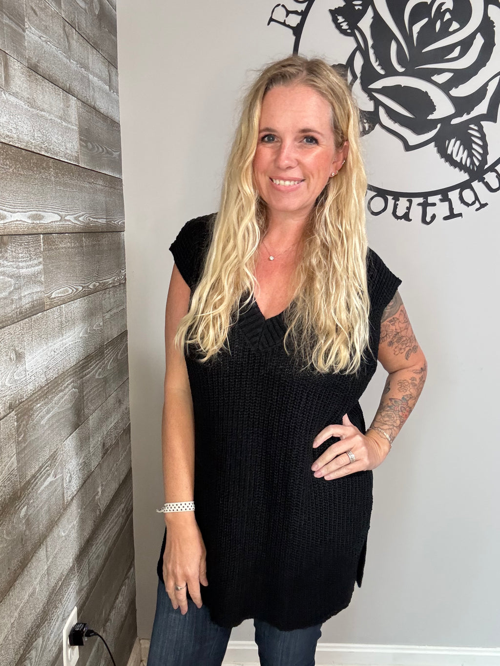 Black V-neck tunic sweater vest. S&m