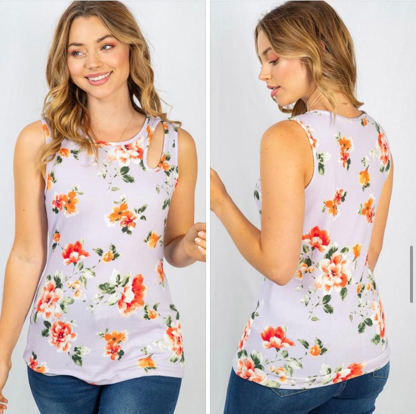 Lilac floral tank with shoulder cut out.